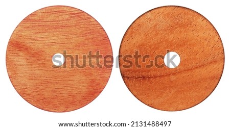 Wooden wheels isolated on white background. Round wheel for toys concept, Vintage toy part Royalty-Free Stock Photo #2131488497