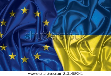 European union and Ukraine two folded silk flags together Royalty-Free Stock Photo #2131489341