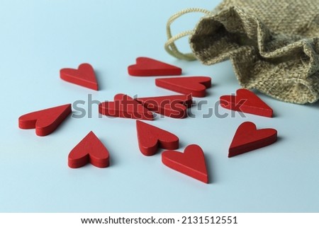 Wooden red hearts. A love nest, a love relationship. Family psychology, strong relationships. space