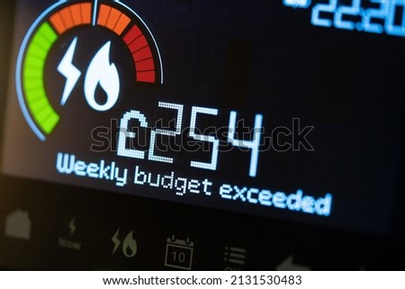 Smart Meter with Budget Exceeded Warning Royalty-Free Stock Photo #2131530483