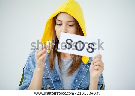 Stop smoking, woman cuts a cigarette with scissors