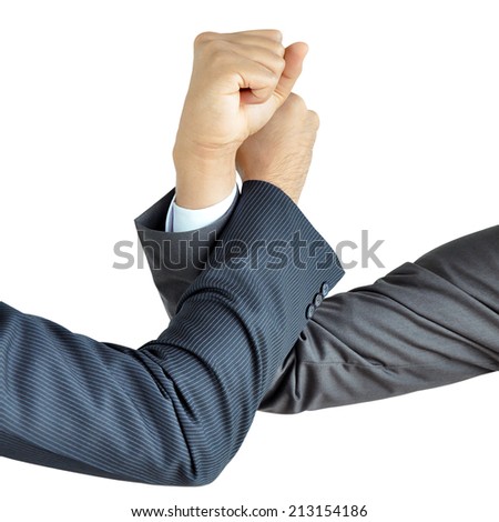 Businessman hands engage in arm wrestling