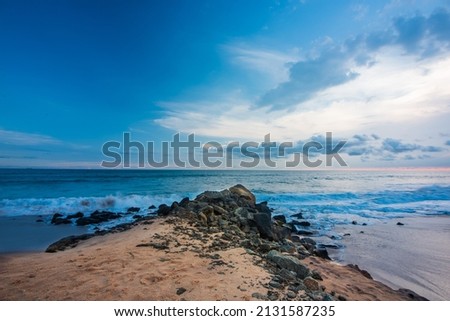 Beautiful shore along with the stones while sunset, Kanykumari, Tamil Nadu.