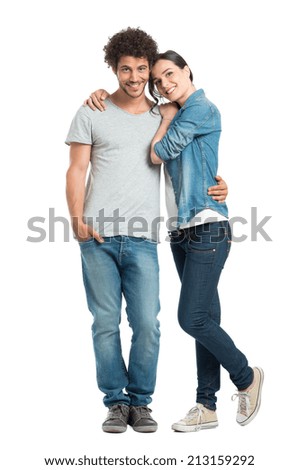 Portrait Of Happy Young Loving Couple Looking At Camera Isolated On White Background