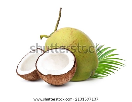 Old coconut with cut in half and green leaf  isolated on a white background Royalty-Free Stock Photo #2131597137