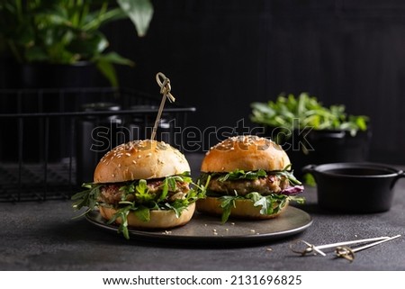 Burgers with chicken cutlet and greens