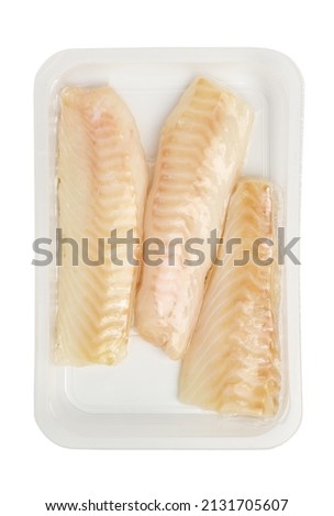 Vacuum packed cod fillets isolated on white background close up