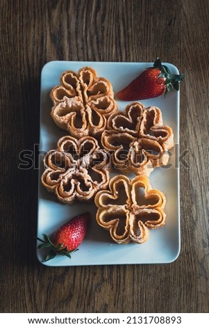 Fried flowers covered with sugar, typical Spanish sweet from Castilla la Mancha y Castilla y León Royalty-Free Stock Photo #2131708893