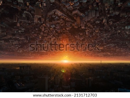 An upside down cityscape with sunlight passing through at sunset Royalty-Free Stock Photo #2131712703