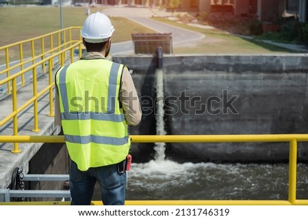  worker on Wastewater treatment concept. Service engineer on  waste water Treatment plant Royalty-Free Stock Photo #2131746319