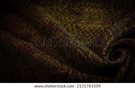 Dense woolen fabric, thick mustard threads. Scarf. Bumblebee fans will love our mustard gold, black and metallic silver knit.