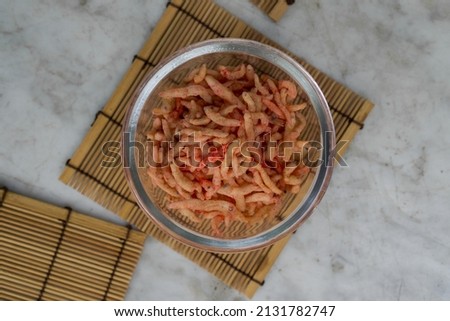 Stock photos of Teri crispy, a traditional Indonesian snack as well as the main course on the menu, is made from small fish called Teri that lives in the sea. It is coated with flour and deep-fried. 