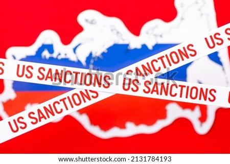 Two lines with inscription Sanctions on the background of Russia map. Concept of sanctions on Russia