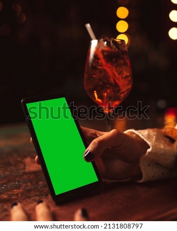 Phone green screen mockup romantic date man woman hand in hand coffee wine 