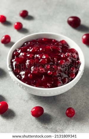 Homemade Sweet Lingonberry Jam in a Bowl Royalty-Free Stock Photo #2131809341