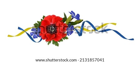 Bouquet of flowers in red, yellow and blue colors with silk ribbons isolated on white background. Concept of Ukraine. Colors of national flag.  Royalty-Free Stock Photo #2131857041