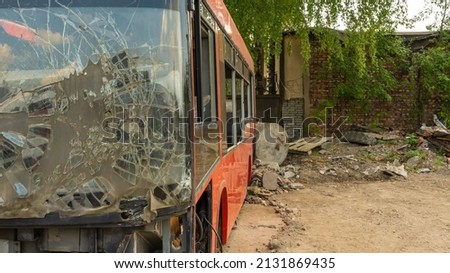 the destroyed bus after the accident. a looted passenger bus. background picture.