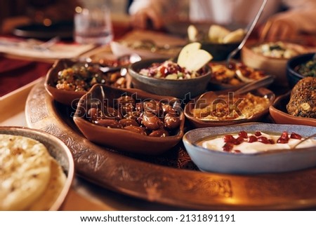 Close-up of variety of food during Iftar meal on Ramadan. Royalty-Free Stock Photo #2131891191