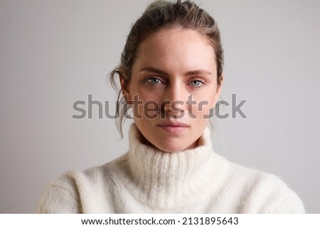 Young woman with messy hair looking at the camera isolated on white background. Royalty-Free Stock Photo #2131895643