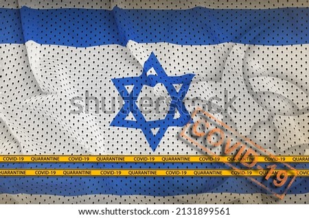Israel flag and orange Covid-19 stamp with border tape. Coronavirus or pandemic 2019-nCov virus concept