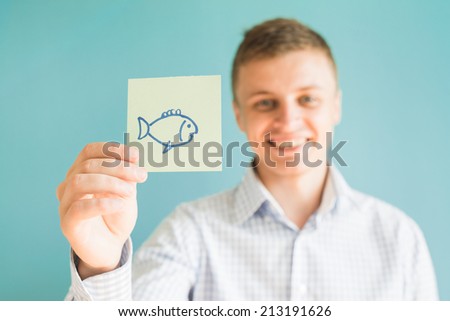 Picture icon in the hand fish