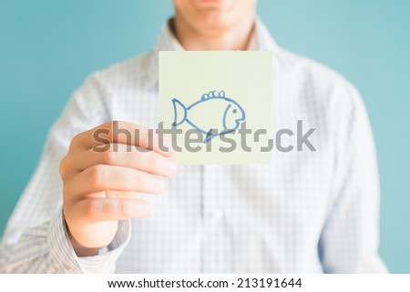 Picture icon in the hand fish