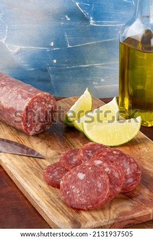 Traditional Italian salami on cutting board