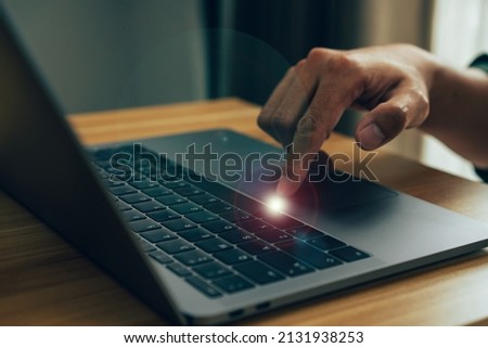 Fingers touch keyboard concept, Closeup photo of male hands with laptop, Man working remotely at home.