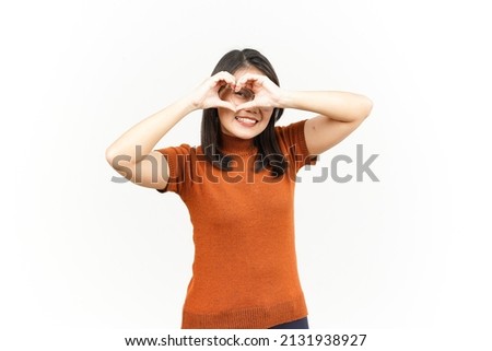 Showing Love or Heart Sign Of Beautiful Asian Woman Isolated On White Background