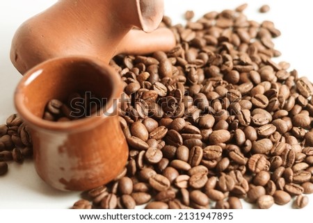 coffee beans with brown mug  with white background - with edit 