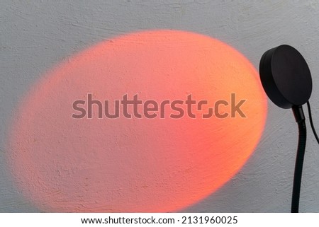 Sunset projector lamp. Multi colored RGB light. Home decor. Copy space