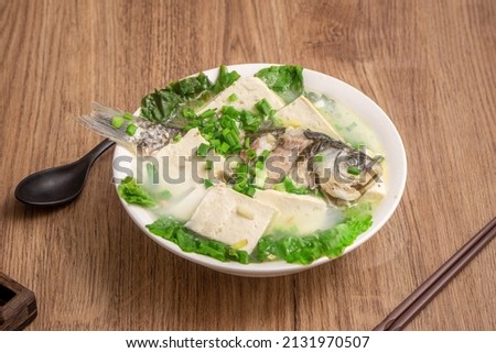Light and healthy crucian carp tofu soup Royalty-Free Stock Photo #2131970507