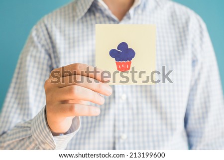 Picture icon cupcake in hand