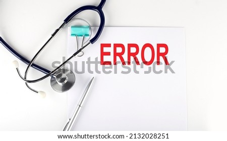 ERROR text written on the paper with stethoscope. Medical concept.
