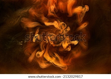 Orange smoke on black ink background, colorful fog, abstract swirling ocean sea, acrylic paint pigment underwater Royalty-Free Stock Photo #2132029817