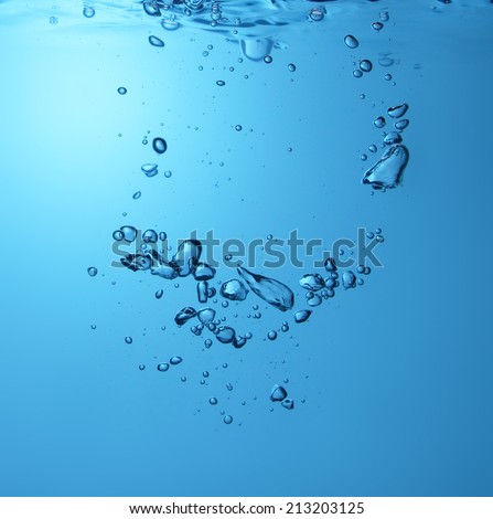 High resolution, bubbles in clean drinking water. Beautiful blue background.