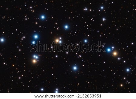 M44 star cluster in constellation of Cancer. Photographed with star-tracker and telescope with long exposure. Royalty-Free Stock Photo #2132053951