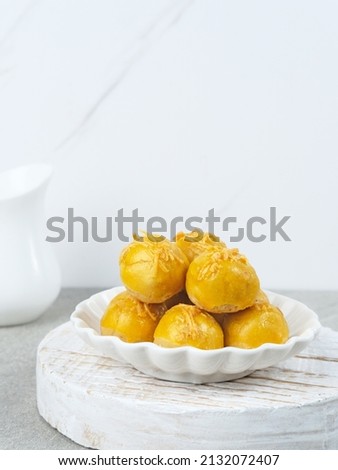 Nastar, Nastar Cookies with pineapple jam inside. Familiar during the month of Ramadan and Eid Fitri. Selective focus image, blurred background.
 Royalty-Free Stock Photo #2132072407
