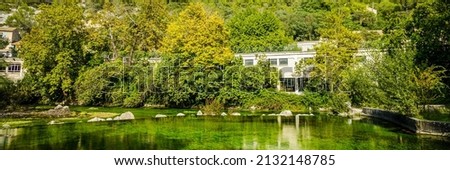 Sorge river in Fontaine-de-Vaucluse, France Royalty-Free Stock Photo #2132148785