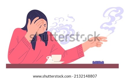 Woman smoking under stress holding a cigarette in her hand