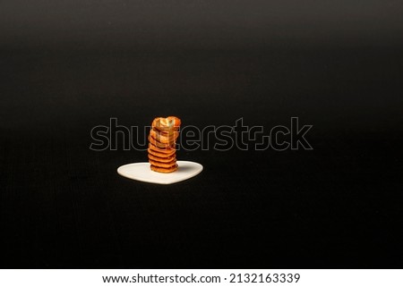 Hearts Shaped Biscuit Stack, Biscuits Heap On Hearts Shaped Plate, Isolated With Black Background