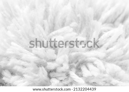 Macro yarn texture,Abstract Macro Shot of a Light Grey Carpet With Long Fibers. Macro Photography Concept