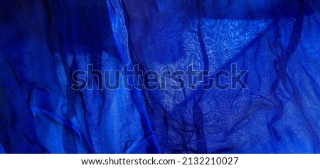 Wrinkled silk. Blue color. Its relaxed, flowing drapery falls like a waterfall over soft silhouettes. Add designs, greeting cards and projects to your project repertoire and wow everyone!