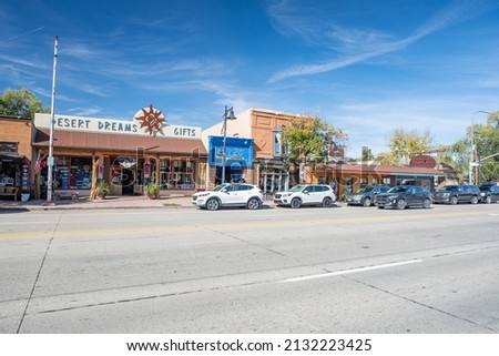 Moab, Utah: October 23, 2021:  Exterior of stores in the city of Moab, Utah.  Moab is a popular tourist destination due to its proximity to two national parks. Royalty-Free Stock Photo #2132223425
