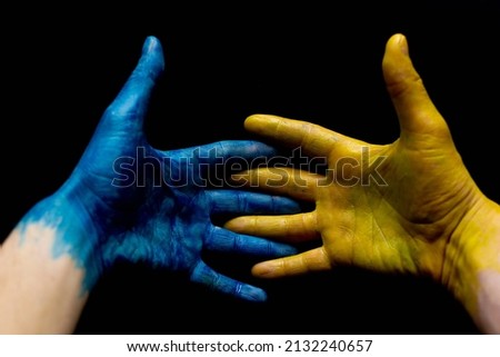 Blue and yellow ukrainian hands isolated symbolic