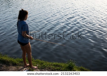 woman on vacation enjoying the river