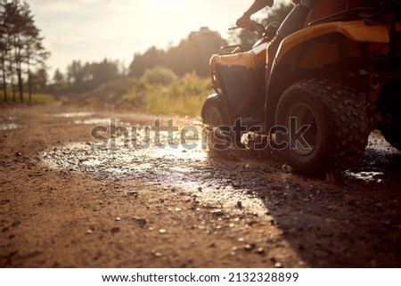 Four wheeler in the nature.Quad Bike in the mountains in mud Royalty-Free Stock Photo #2132328899