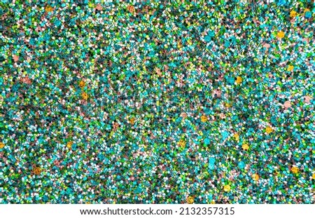 Many multicolored shiny stars as a background, texture. High quality photo