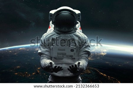 3D illustration of Astronaut at the Earth orbit. 5K realistic science fiction art. Elements of image provided by Nasa