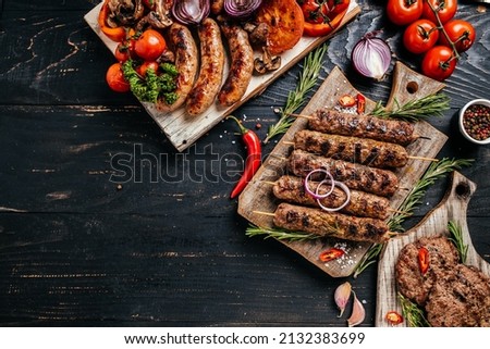 mix kebab meat. Kebab adana, chicken, lamb and beef. banner, menu, recipe place for text, top view. Royalty-Free Stock Photo #2132383699